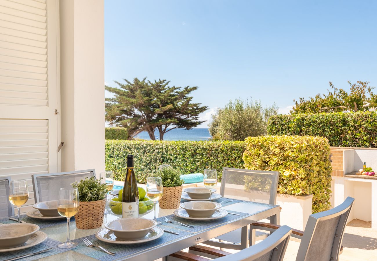 the terrace of this villa in Binisafuller, ideal for moments of tranquillity during your trip.