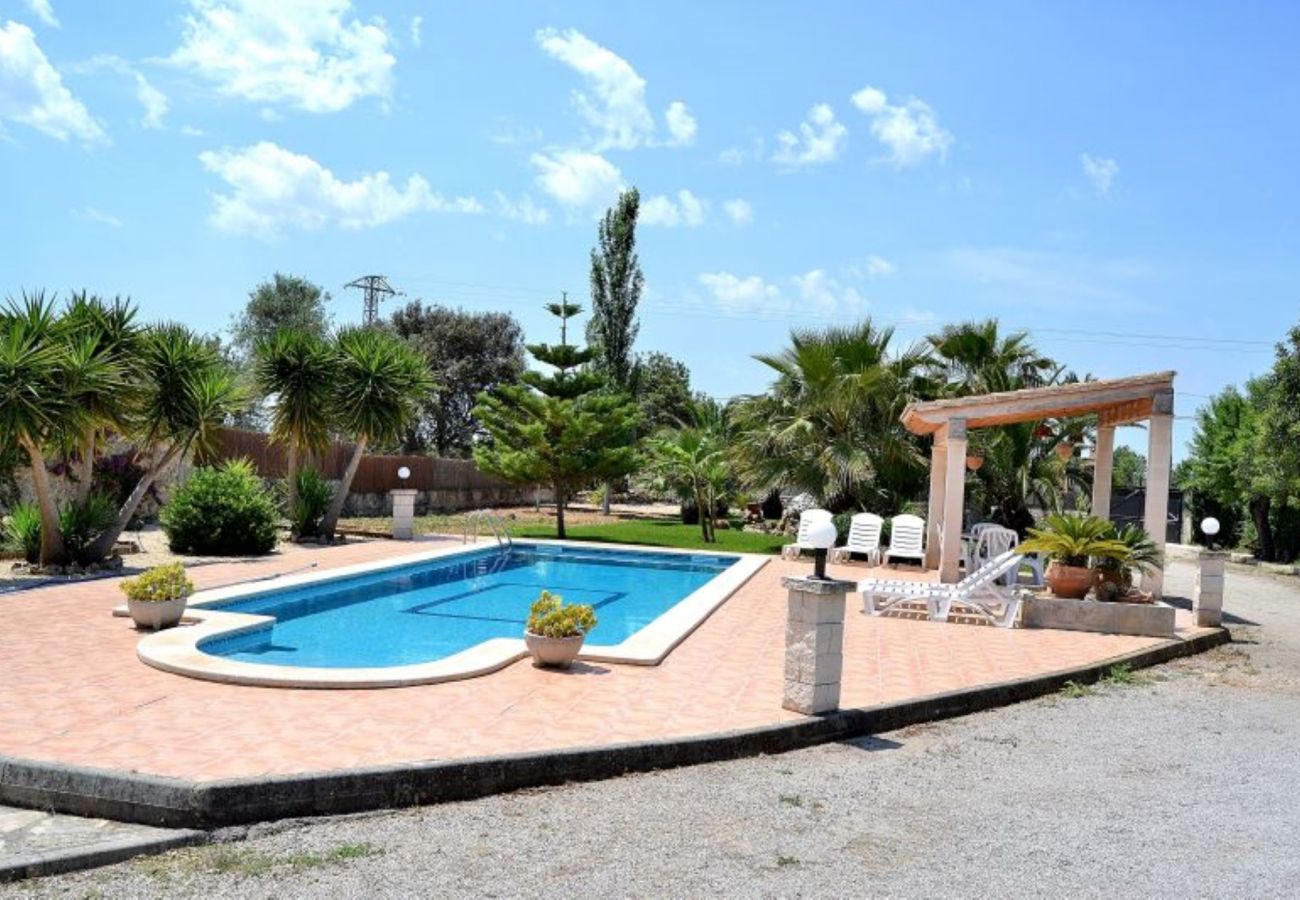 The swimming pool of the villa has room for 6 people