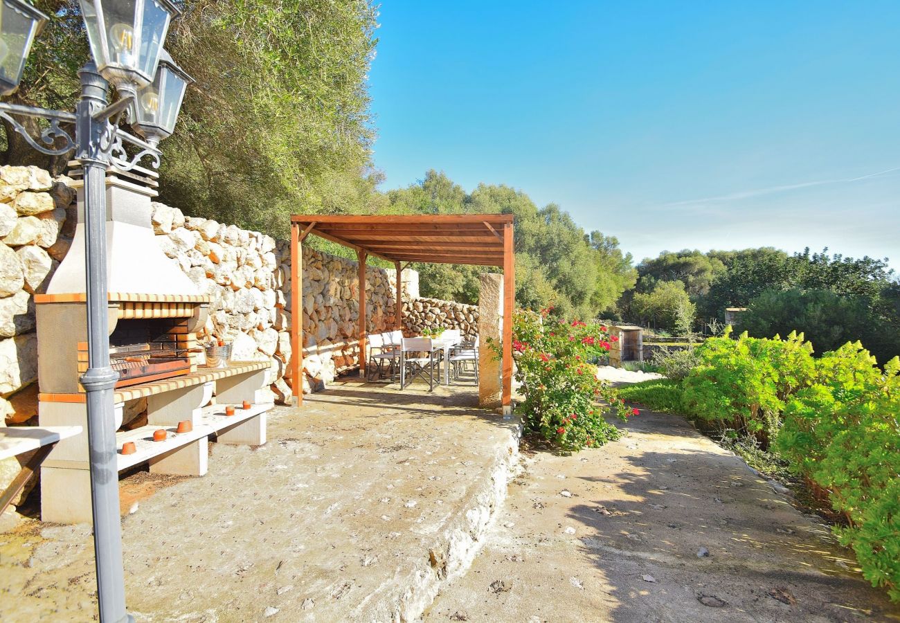 The villa in Alcudia has a terrace with barbecue